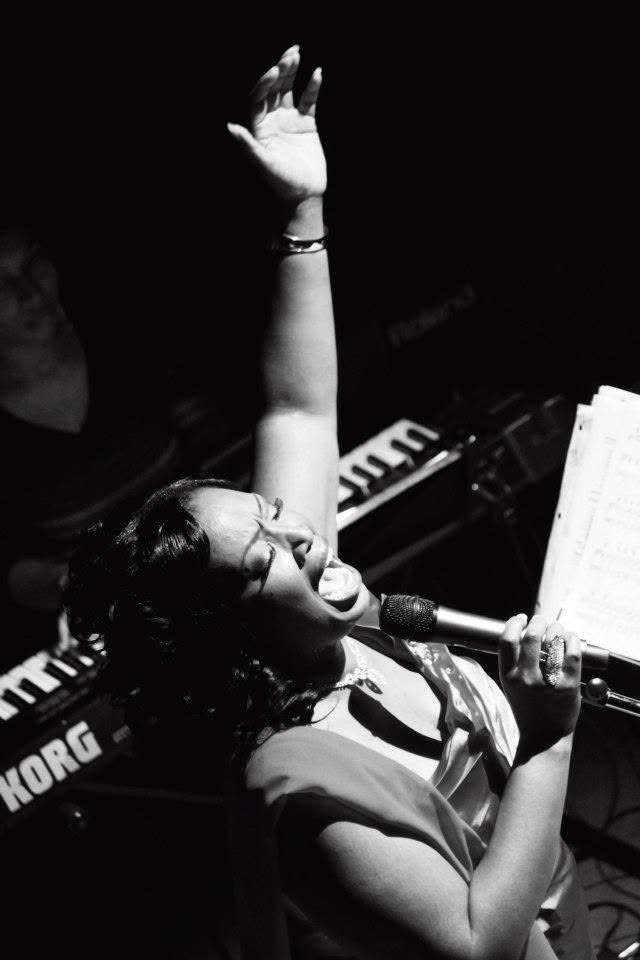 Hand raised mid-song